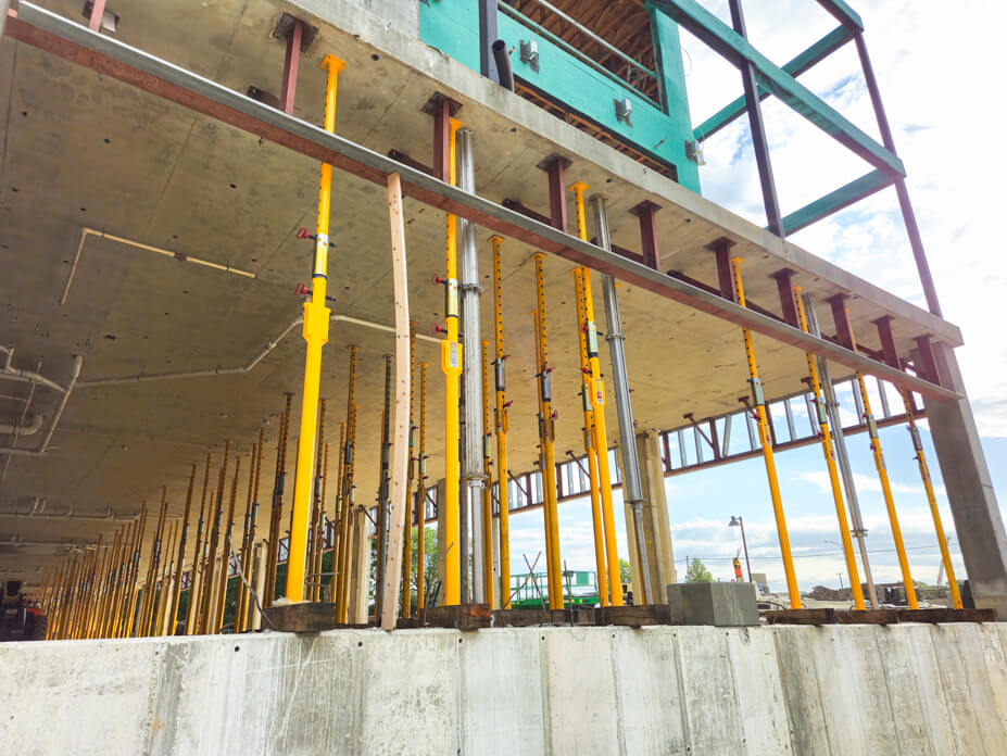 Exterior view of Buckingham jacking-shoring posts supporting a building