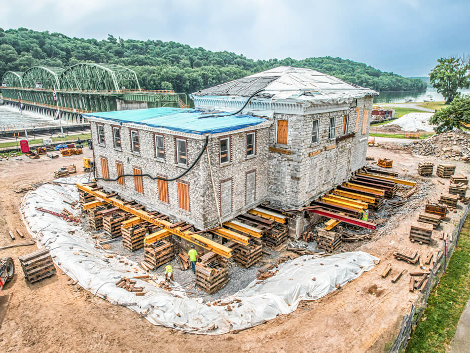 Aerial view of Guy Park Manor sitting on yellow lifting steel