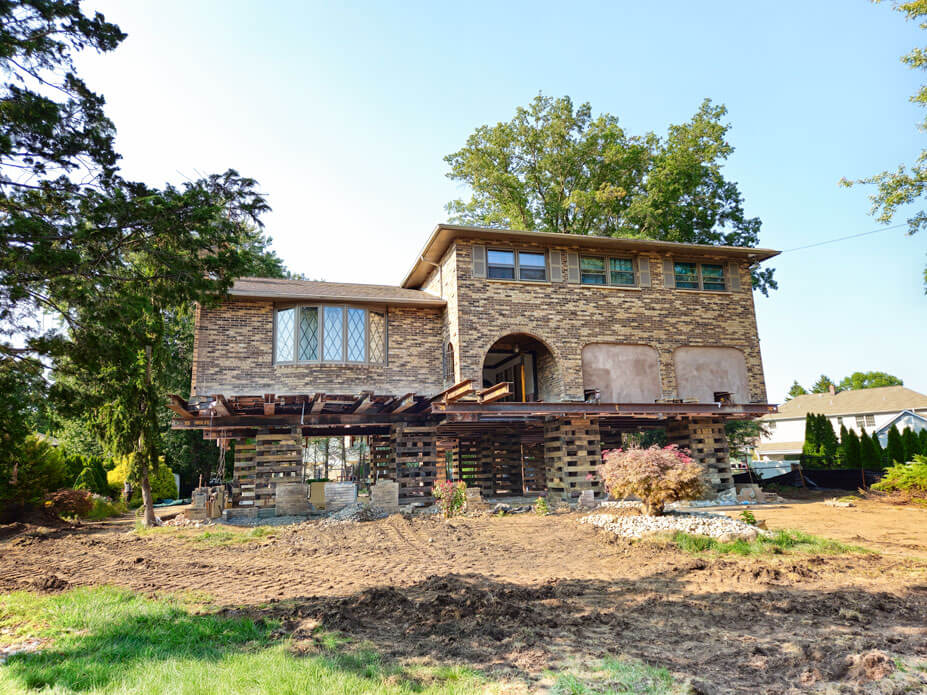 New Jersey house sits on cribbing and steel 8' above its previous elevation